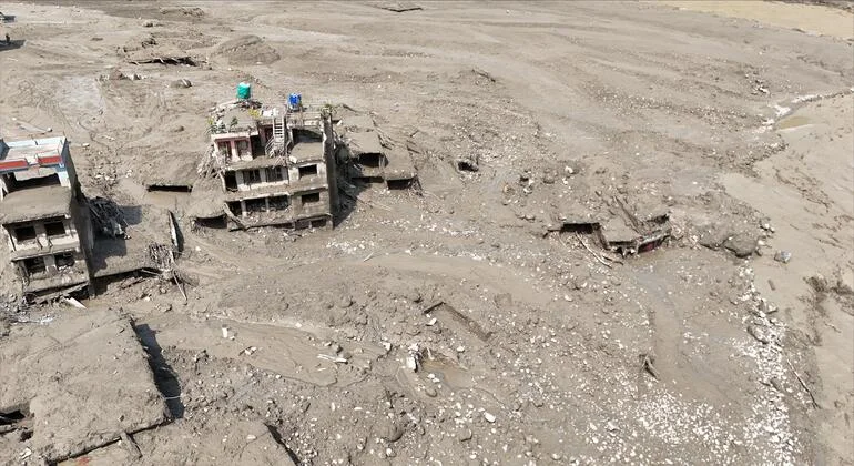 UN agencies report deadly floods causing widespread destruction in China and Nepal