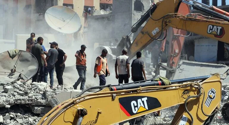 At least 20 killed in Gaza City building collapse as search continues